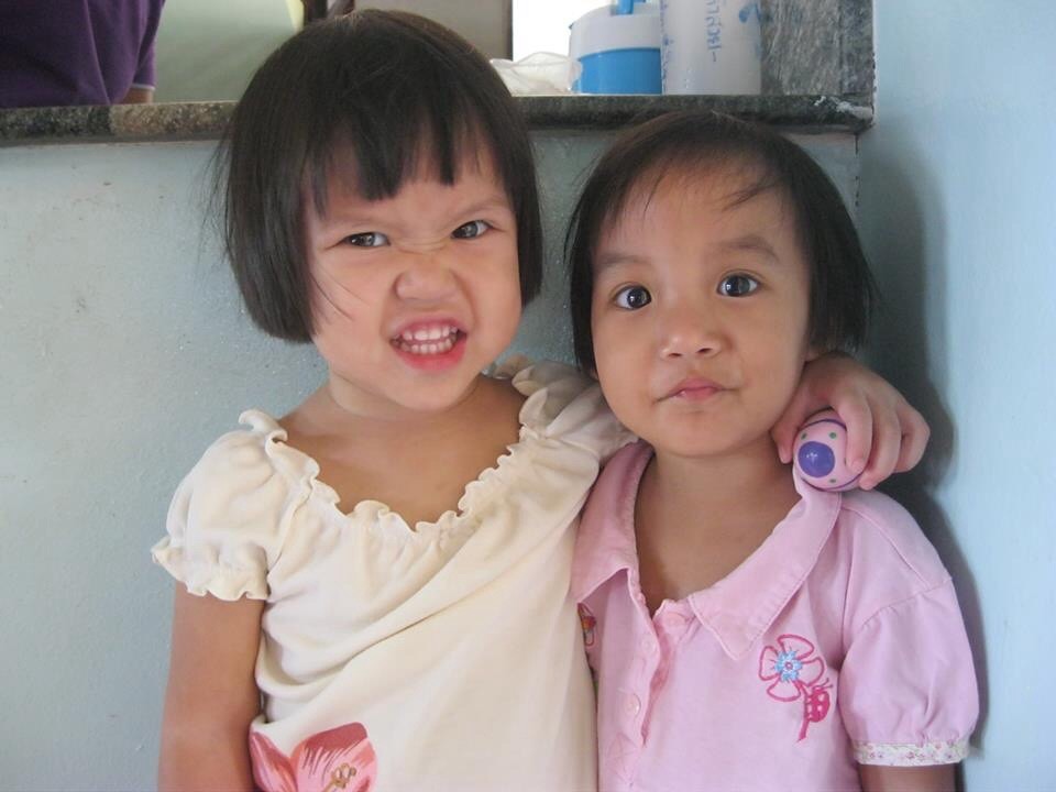 Photo of two girls from Agape Home in Thailand.