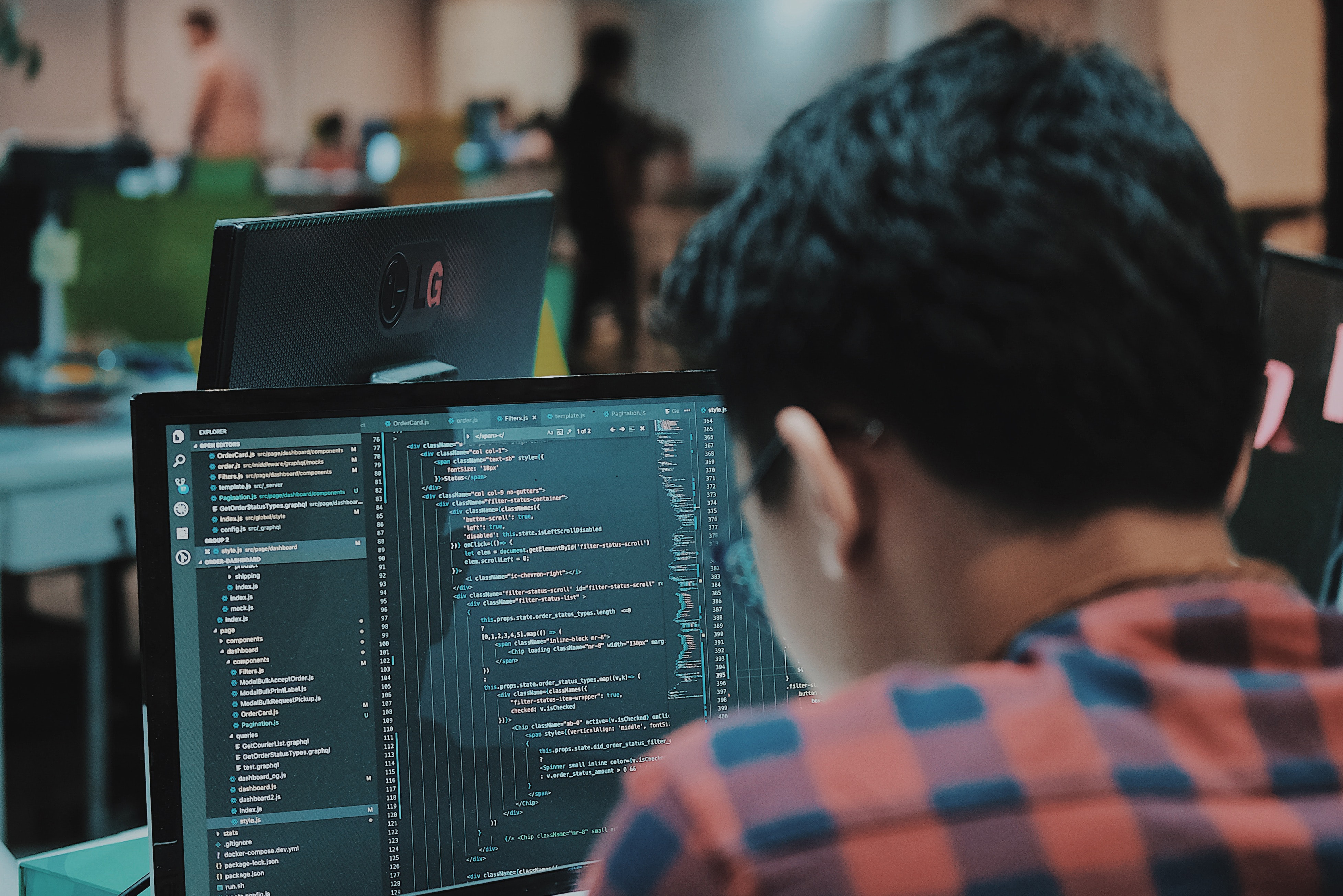 Photo of someone working on code by Oopsarif Riyanto on Unsplash