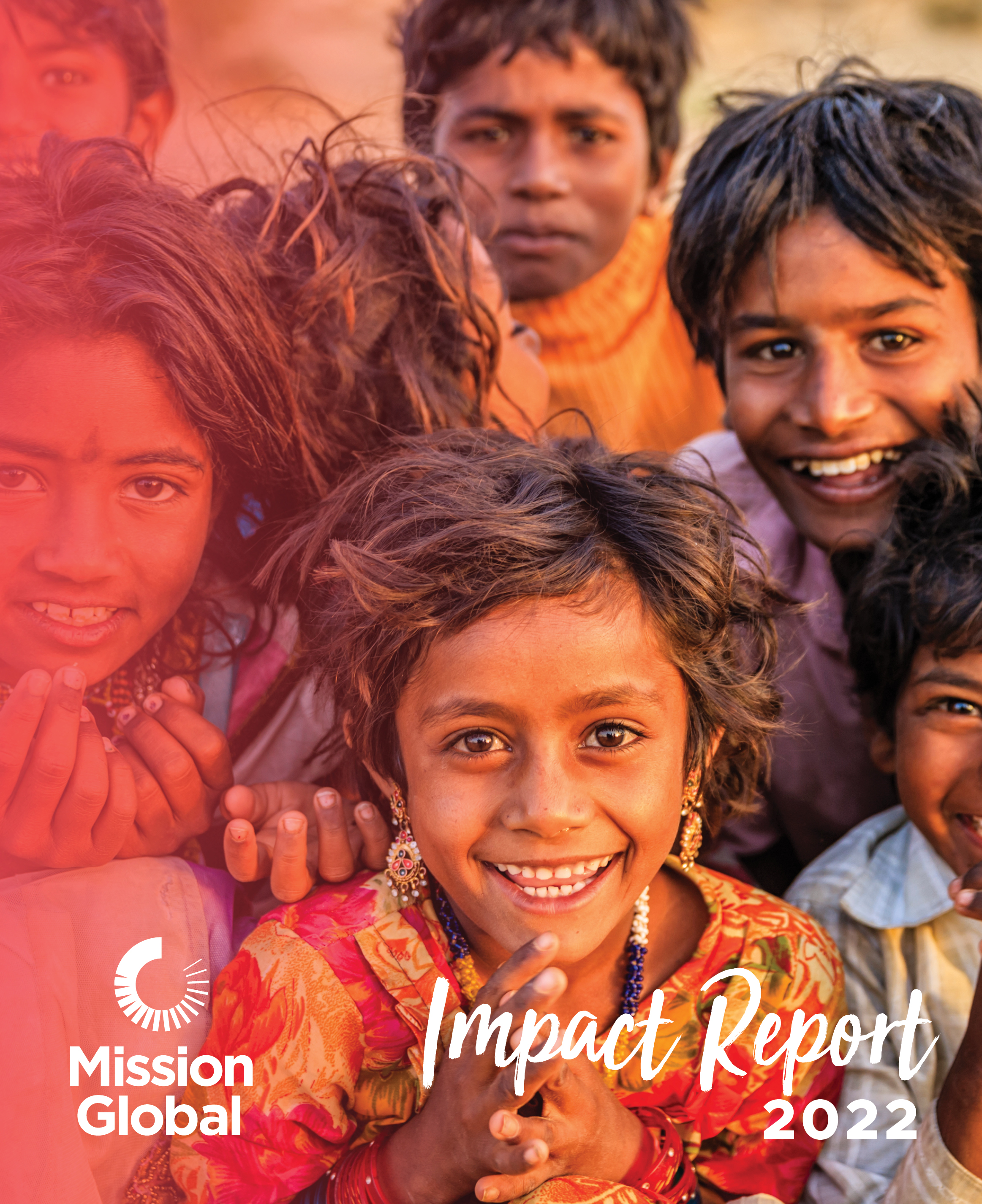 Cover of the 2022 Impact Report of a group of children smiling at the camera.