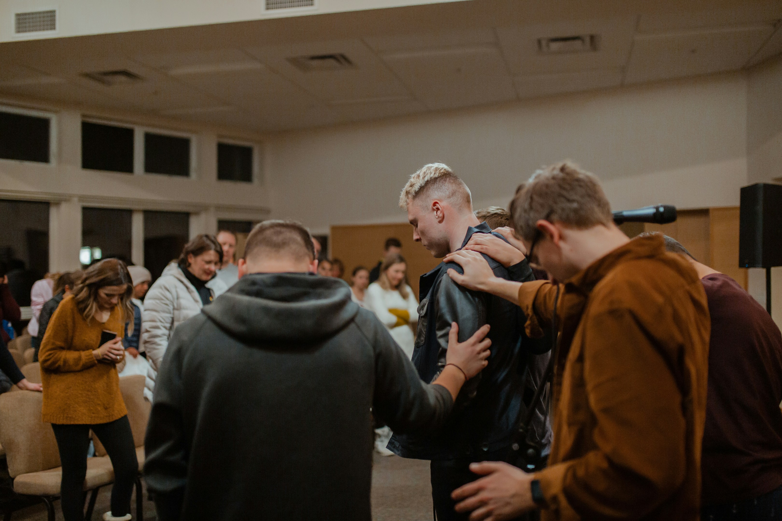 EFC Prayer - adrianna-geo-W5oBN7u4yfw-unsplash A group of people praying together.