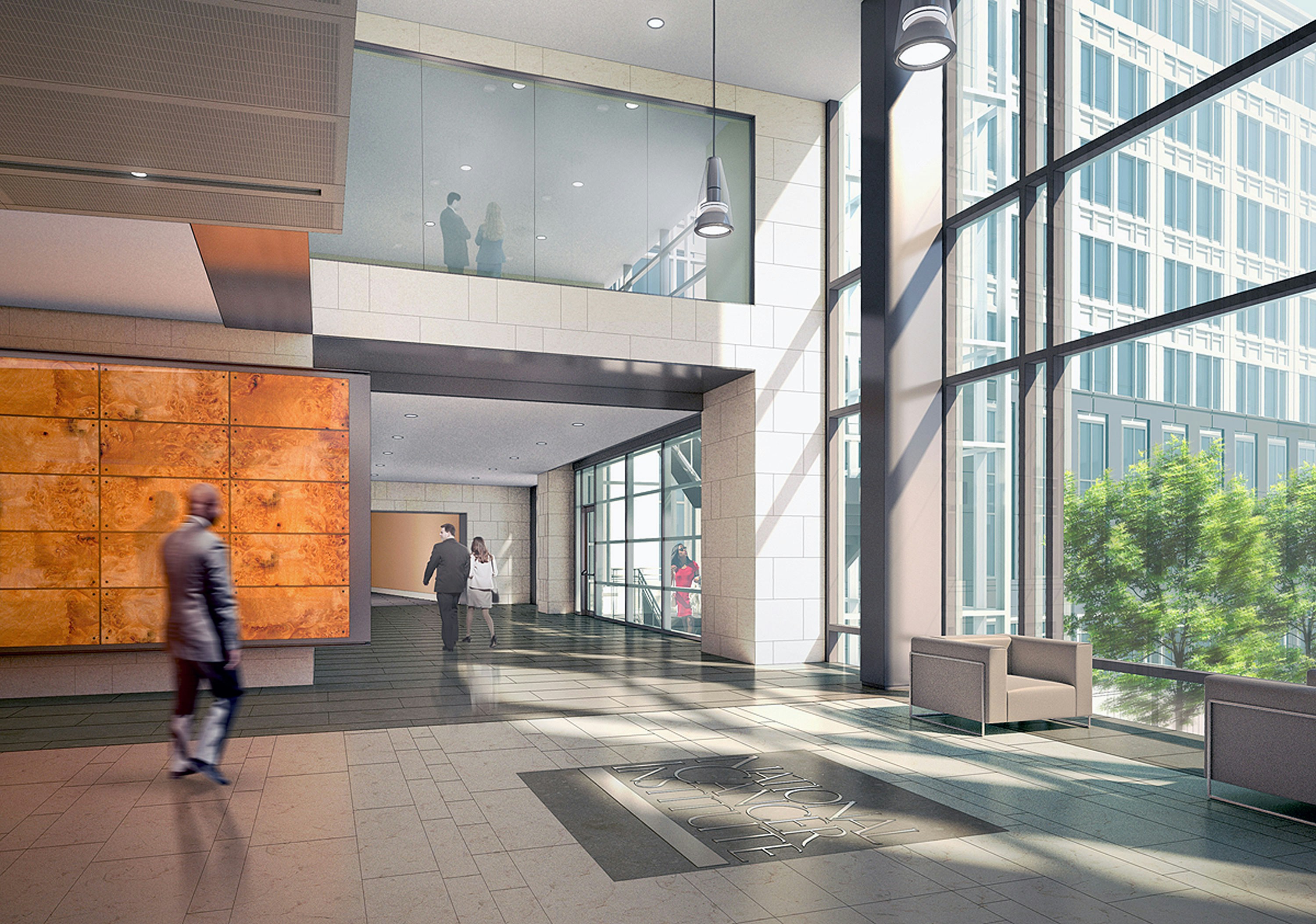 national-cancer-institute-kKJ7VOE6MVo-unsplash People walking through the lobby of a building.