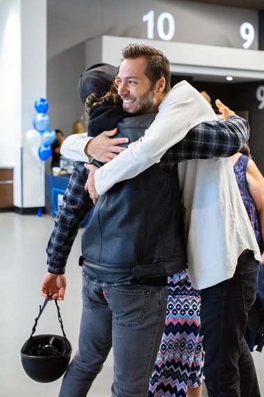 Simon Gau welcoming a guest at the Broadway Church Campus in Surrey, B.C.