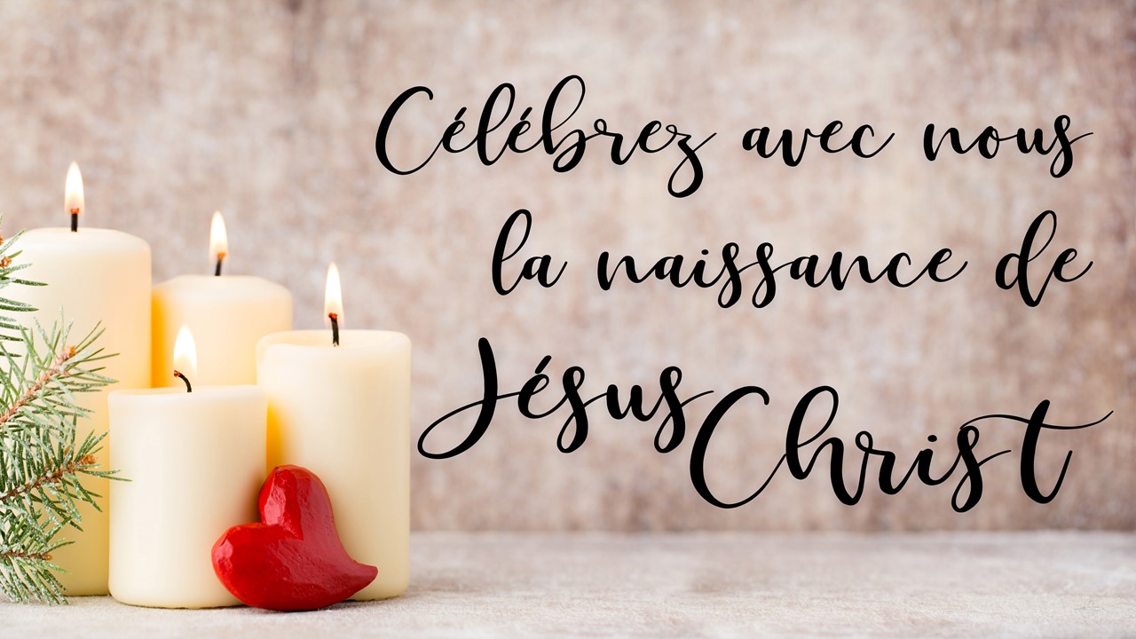 Stock photo of Christmas candles with the words "Wishing You A Very Blessed Christmas" displayed